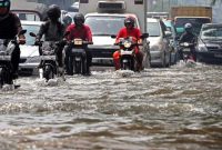 Tips Terobos Banjir Menggunakan Sepeda Motor